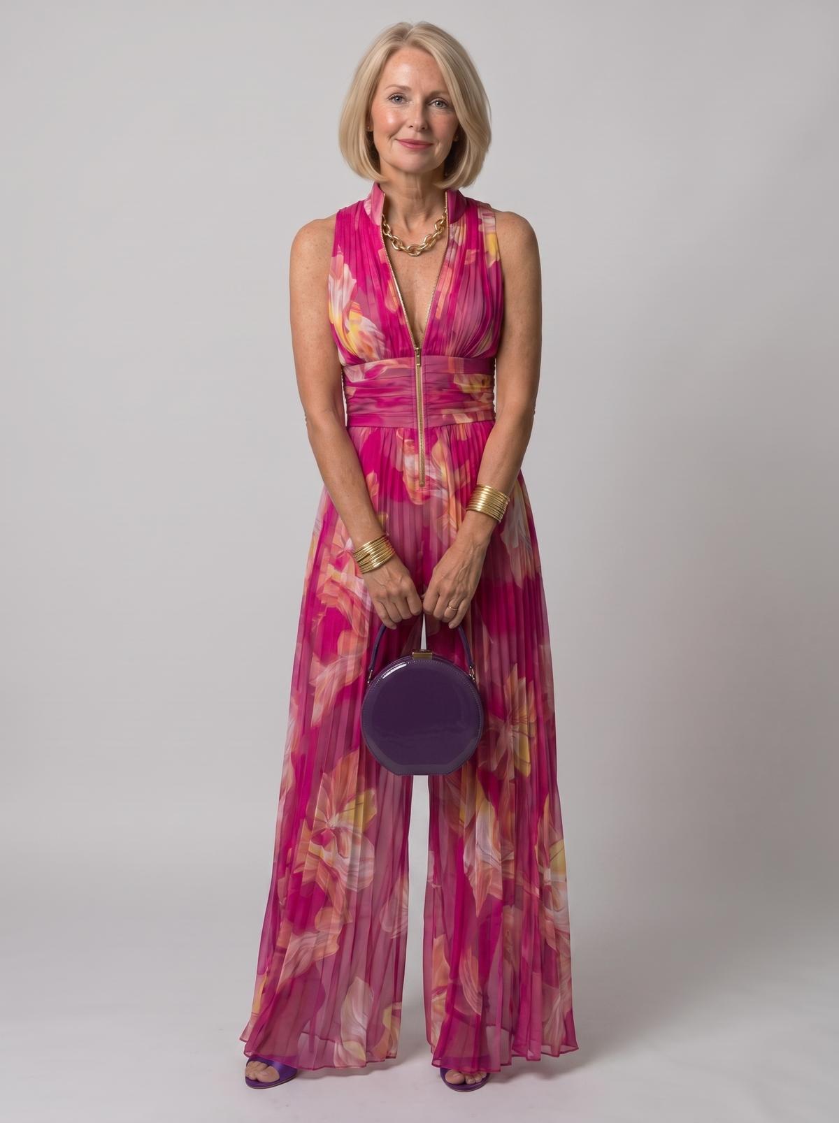 Leabella fuchsia floral pleated jumpsuit worn by model, studio photo