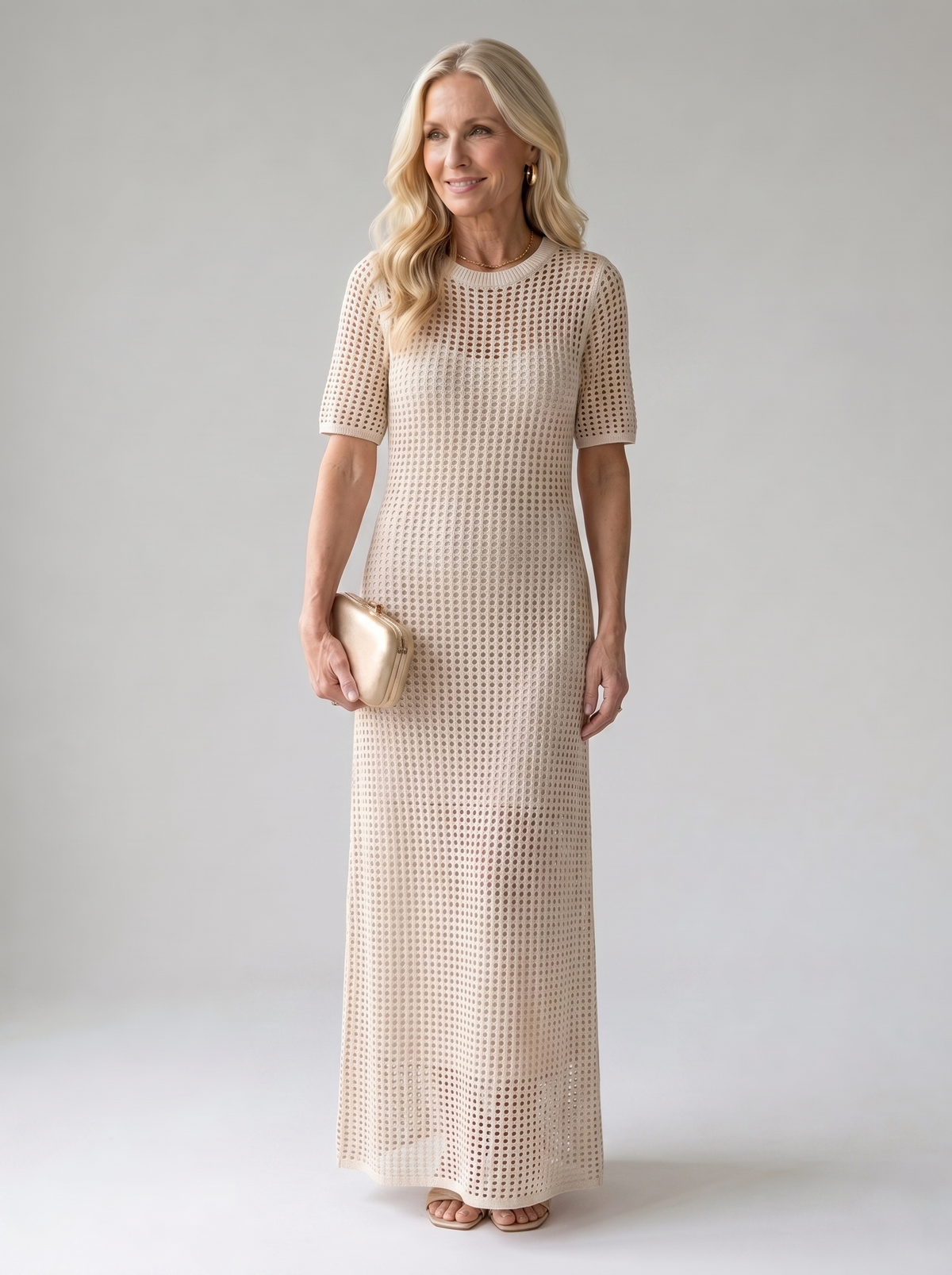 Airlie natural-tone maxi dress worn by model, studio photo