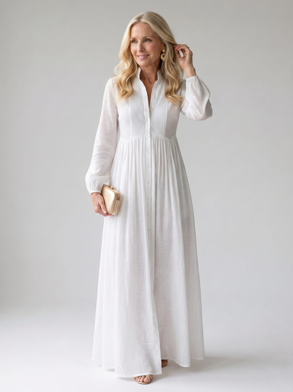 Sita patchwork maxi dress with high collar and long sleeves worn by model, studio photo