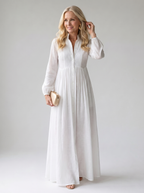Sita patchwork maxi dress with high collar and long sleeves worn by model, studio photo