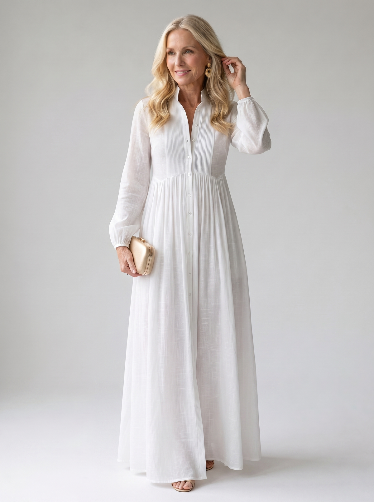 Sita patchwork maxi dress with high collar and long sleeves worn by model, studio photo