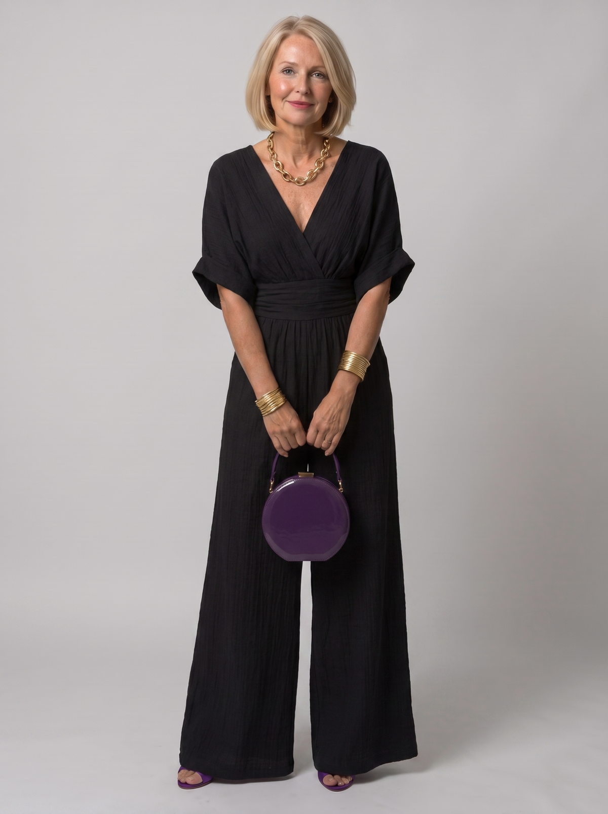 Maja V-neck high-waisted jumpsuit worn by model, studio photo