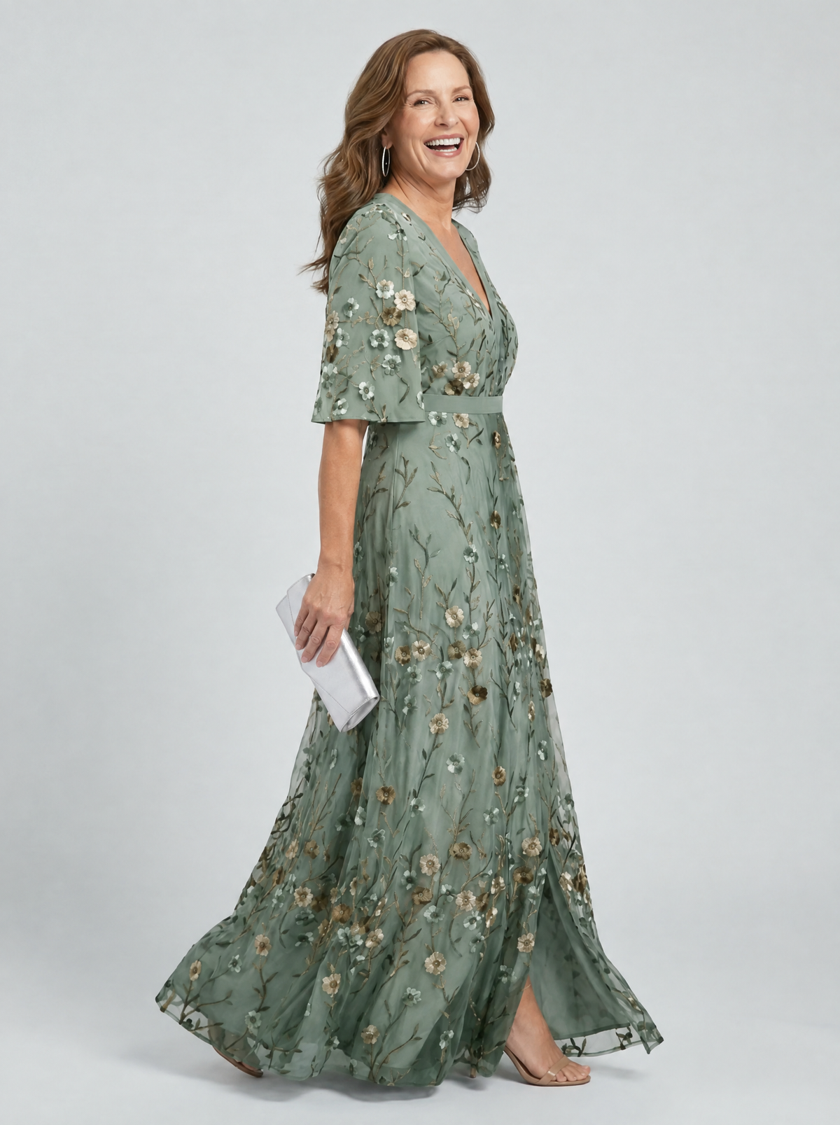 Selora maxi dress side view showing the side split and flutter sleeve